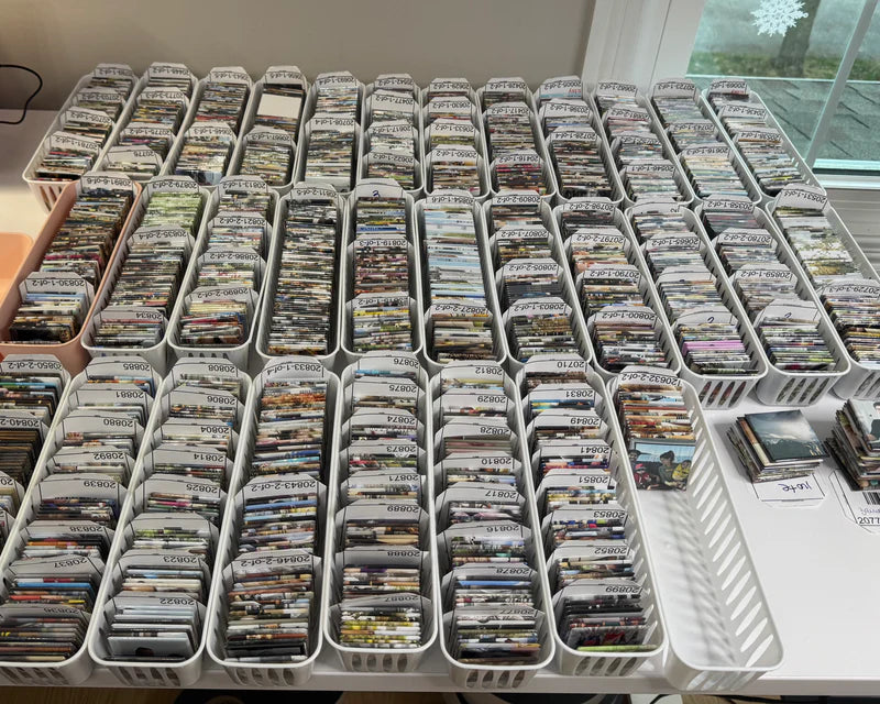 Rows of Heart Printed photo magnet orders arranged across a table